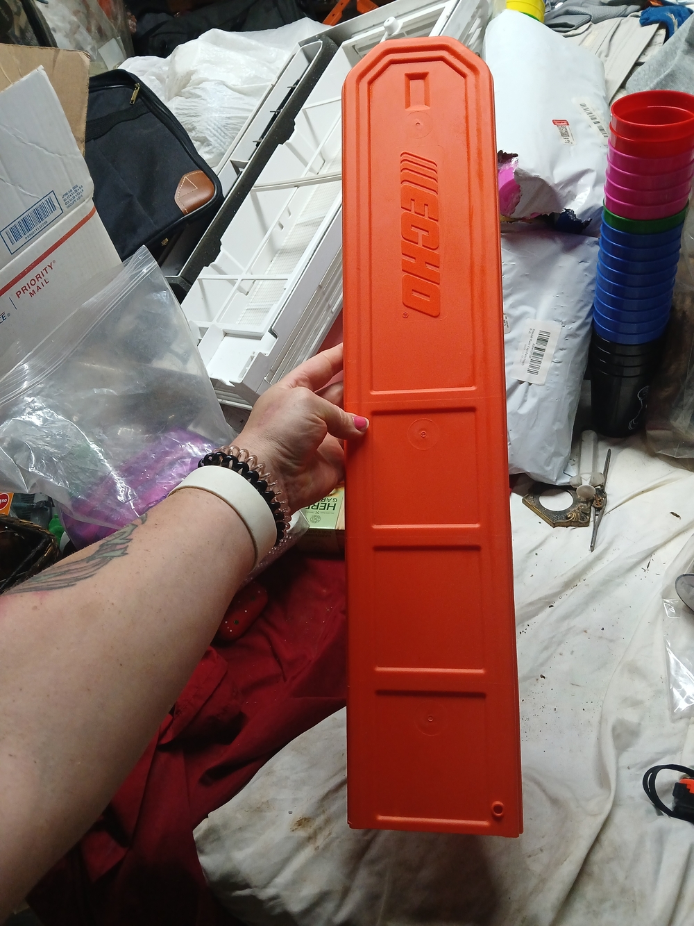 ECHO orange plastic scabbard designed to protect chainsaw blades 24"